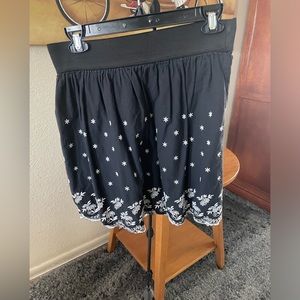 Rhapsody mini- skirt- black with lower floral pattern, medium